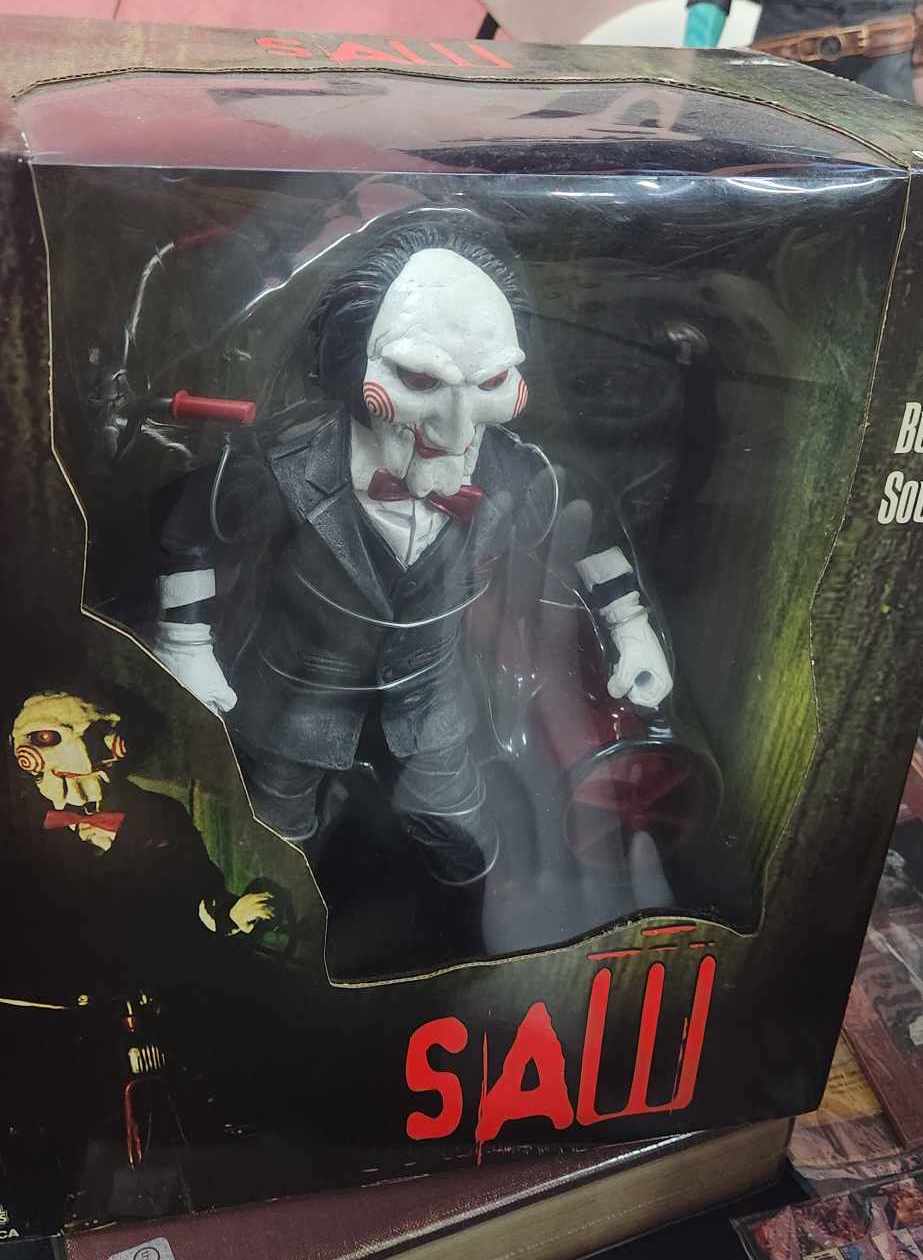 Figurine SAW Jigsaw Billy 12 pouces avec tricycle