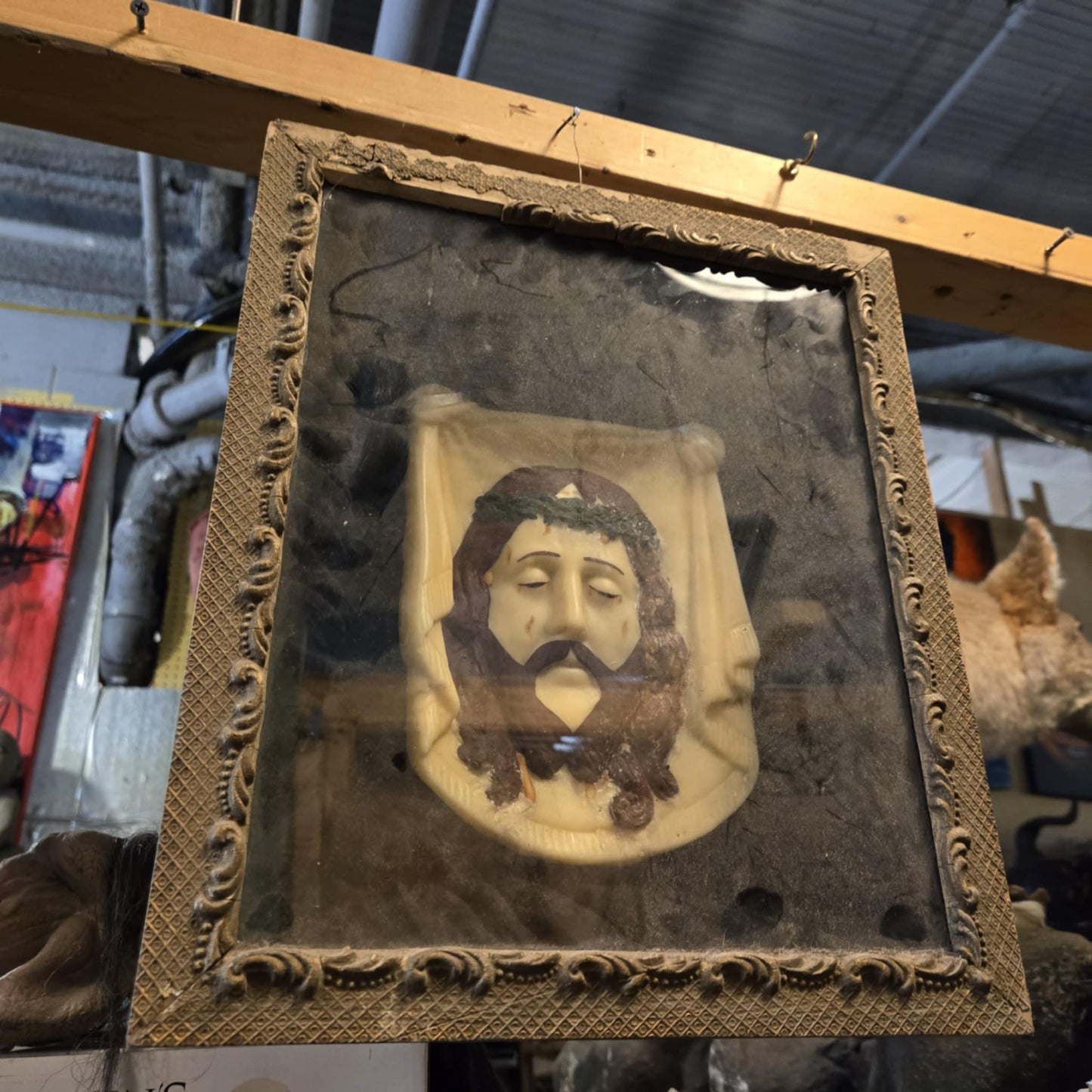 Tête du Christ en bas relief en cire