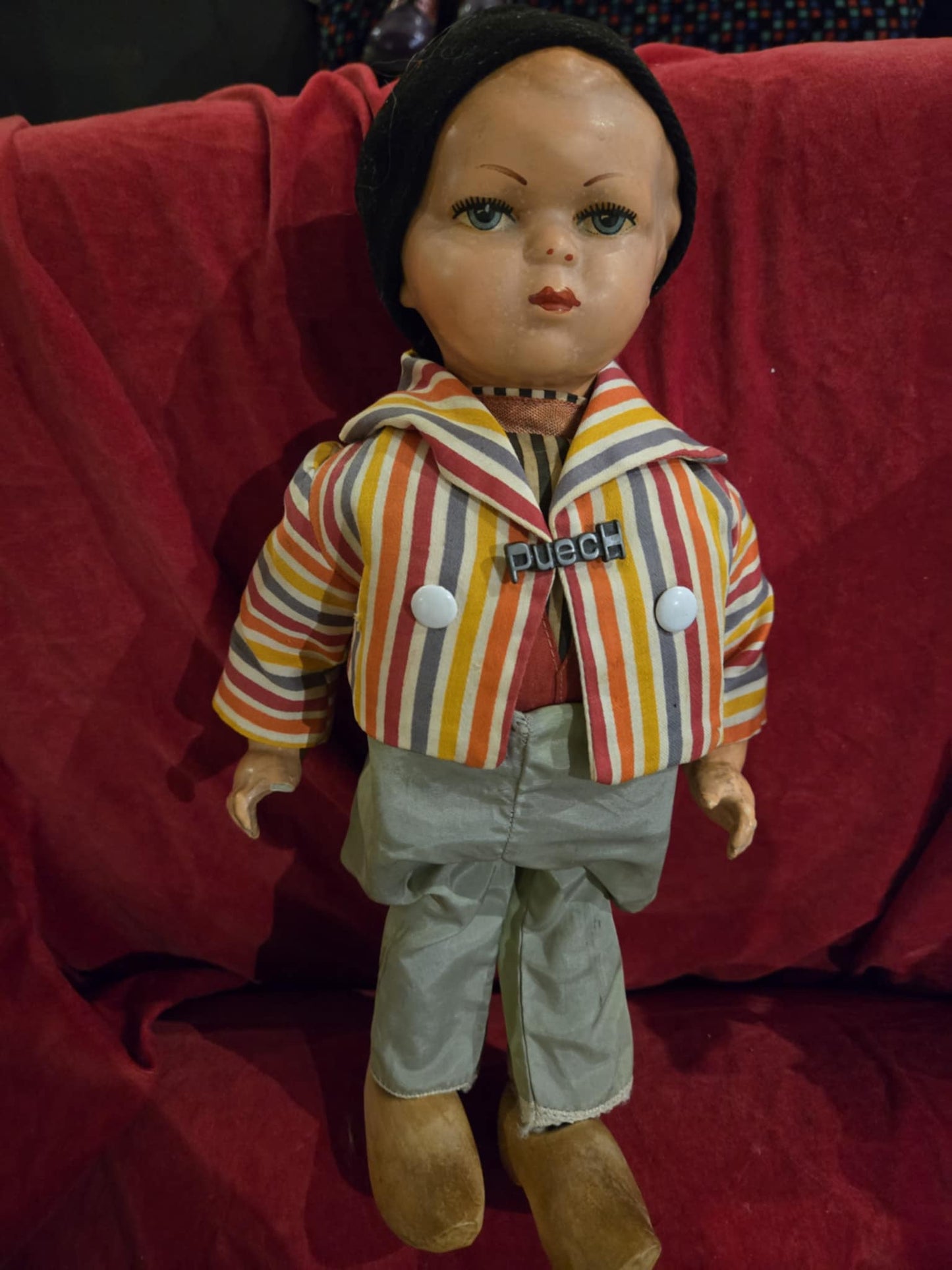 Petite poupée antique française en chemise rayée