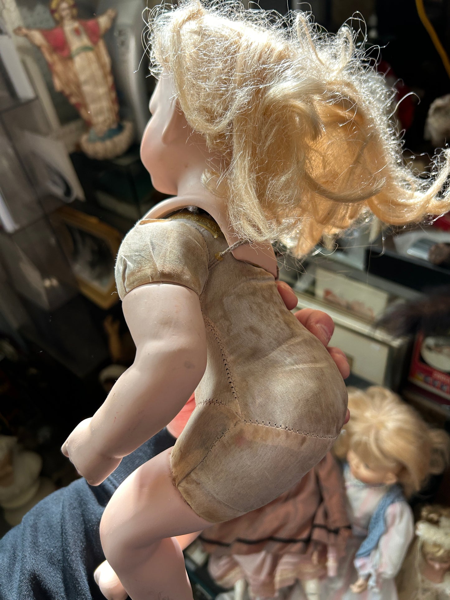 Poupée antique en porcelaine sans vêtements