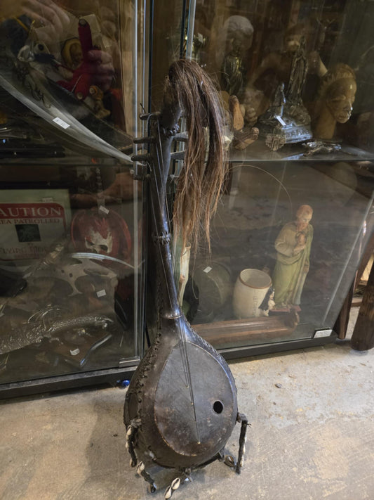 Guitare courge à boucles ramifiée africaine