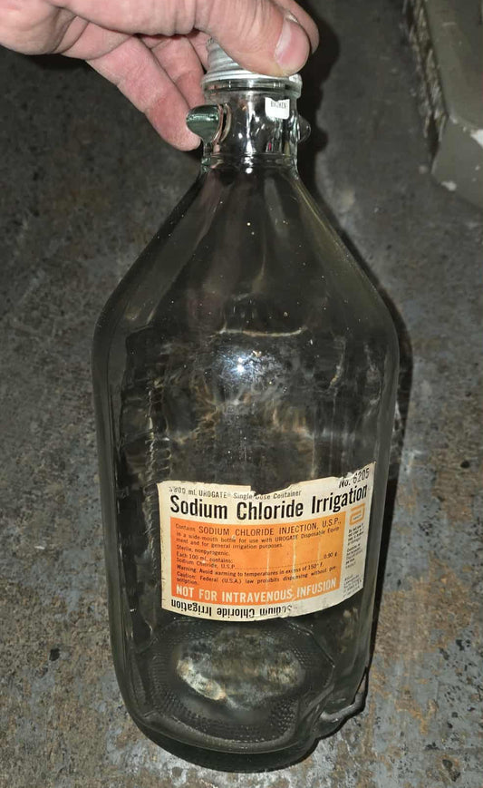 Bouteille ancienne irrigation chloride de sodium