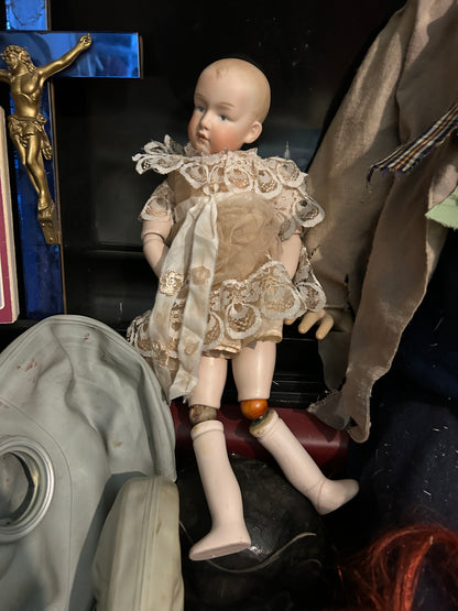 Poupée antique articulée en porcelaine Allemagne
