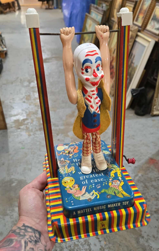 Clown trapèze jouet en métal musical antique Mattel